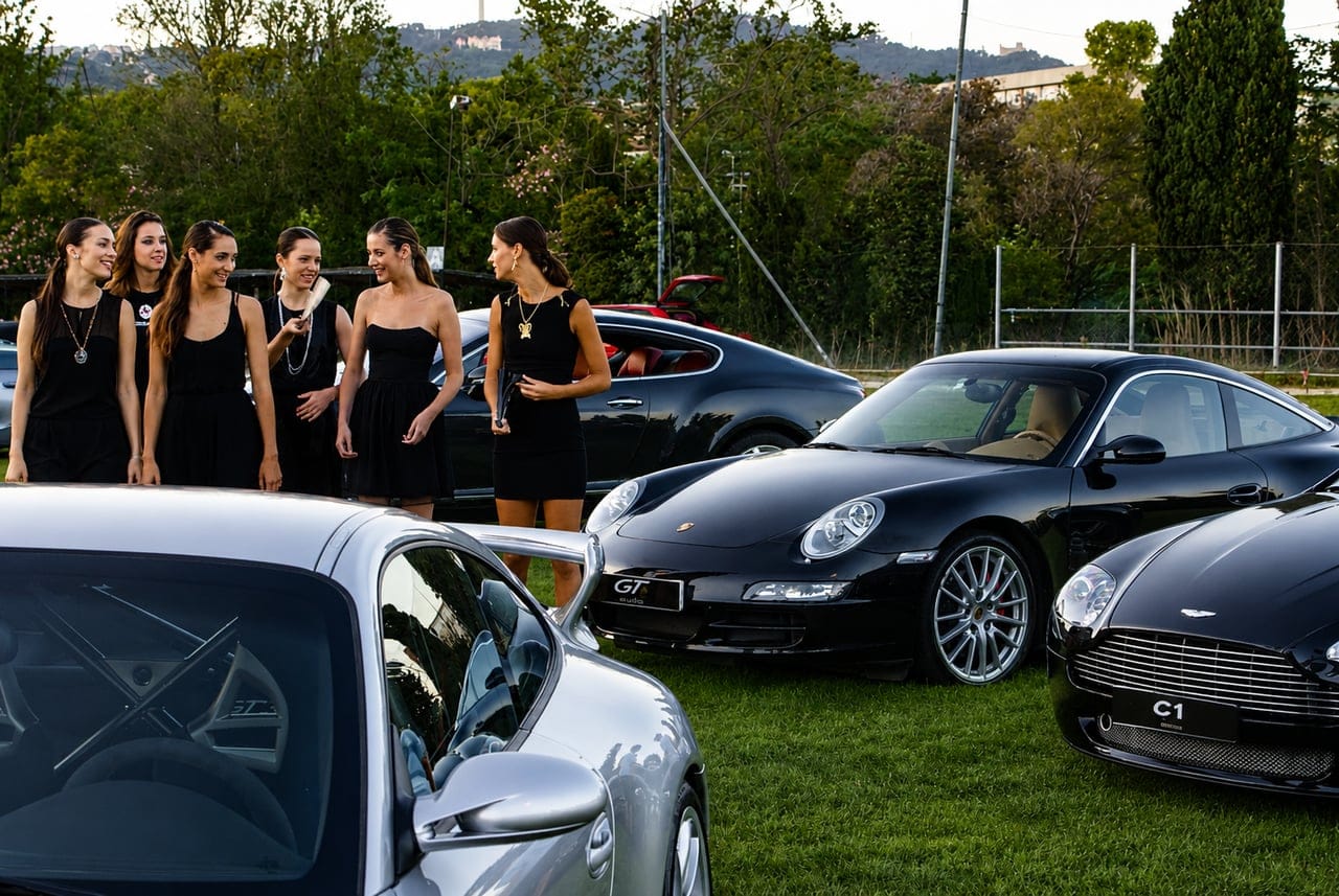 Outdoor GTlife gathering with a Porsche 911, Aston Martin and Bentley