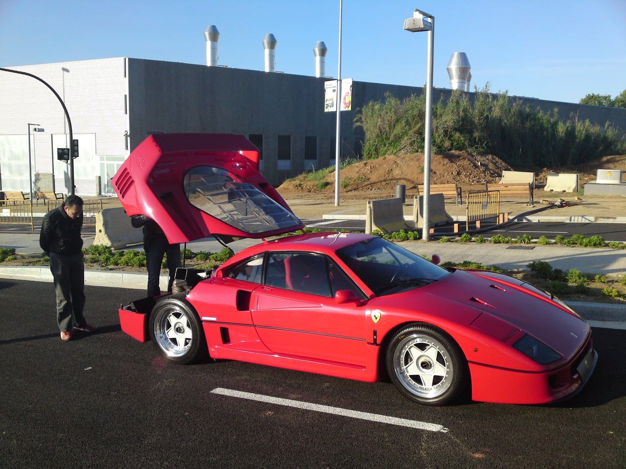 Red Ferrari F40 with the engine cover open at a GTlife gathering