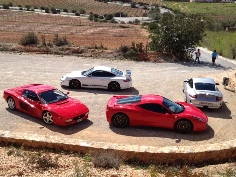 Ferrari Testarossa, Ferrari 458 and GTlife Porsche 911 GT3s at a route stop