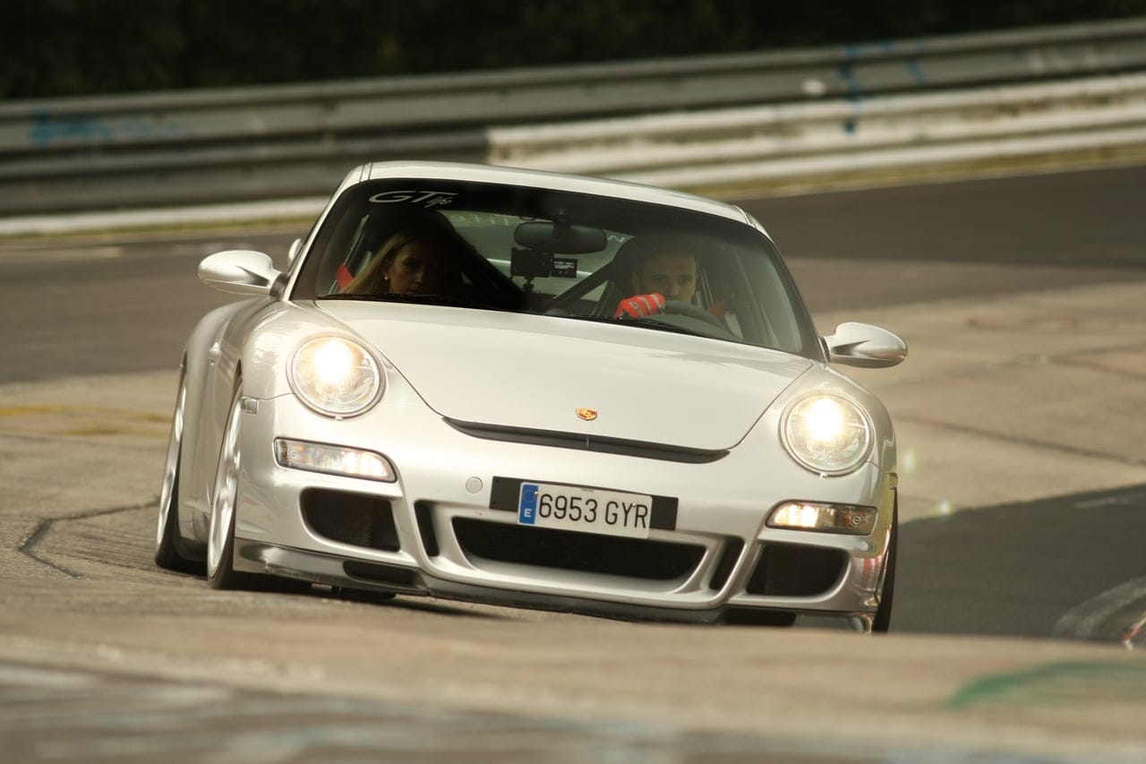 GTlife Porsche 911 GT3 cornering on a racing circuit